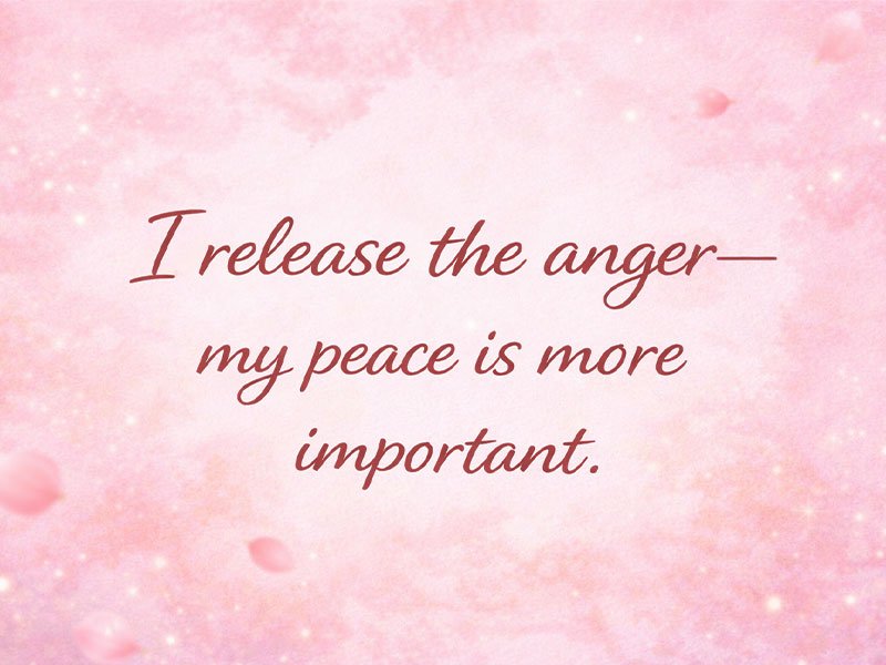 Soft pink background with floating petals and the quote “I release the anger—my peace is more important.” in gentle script text.