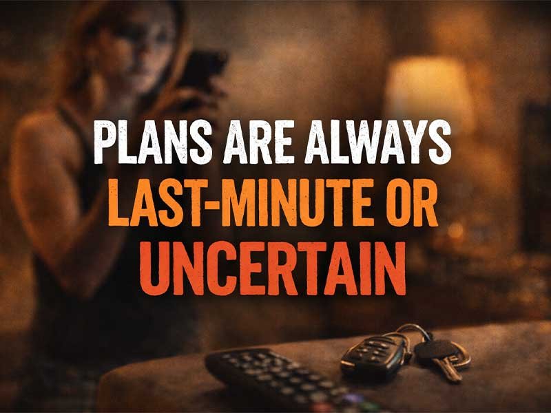 Text graphic saying “Plans are always last-minute or uncertain” over a woman holding a phone with keys on a table.