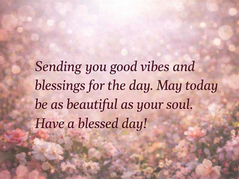 The image contains the text: "Sending you good vibes and blessings for the day. May today be as beautiful as your soul. Have a blessed day!" The background features soft pink flowers with a glowing, dreamy effect.