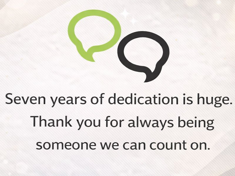 Work anniversary quote on a soft textured background with green and black chat icons: “Seven years of dedication is huge. Thank you for always being someone we can count on.”