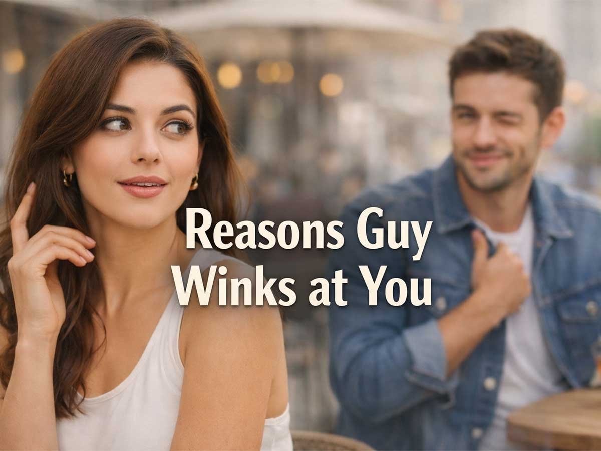 Man winking at a woman sitting at an outdoor café, suggesting playful or flirty interest.