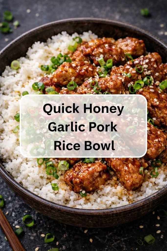 Quick Honey Garlic Pork Rice Bowl with glazed pork over white rice, garnished with sesame seeds and chopped green onions.
